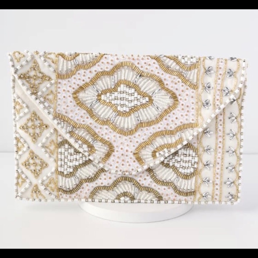 Cream Beaded Clutch: Etched in Stone by Lulu’s.